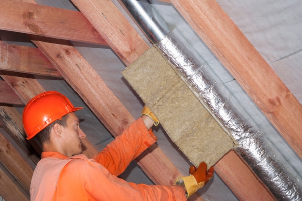 HVAC contractor sealing HVAC ducts & enhancing insulation