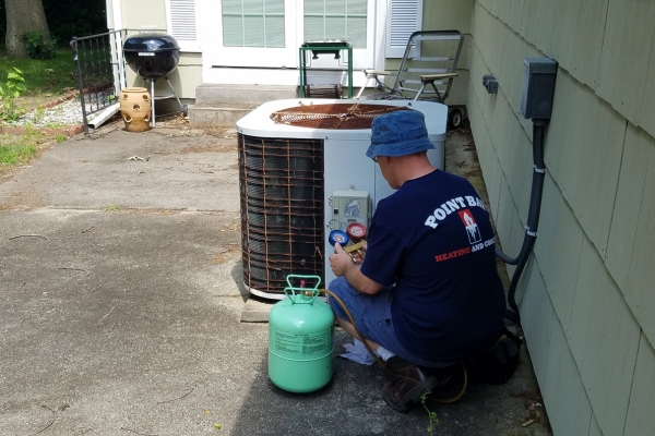 Point Bay Fuel Technician Doing AC Routine Maintenance