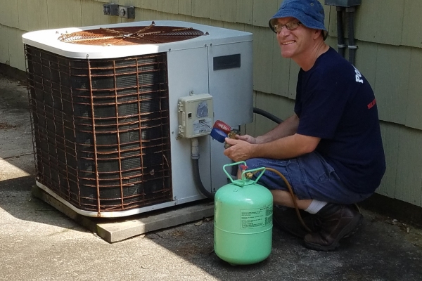 Point Bay Fuel's HVAC technician checking for refrigerant leak