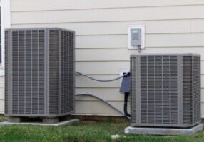 residential air conditioners installed outside the house