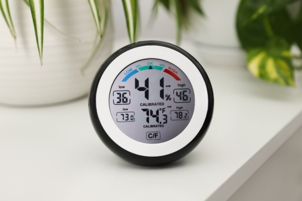 home thermometer and hygrometer depicting indoor air quality & humidity