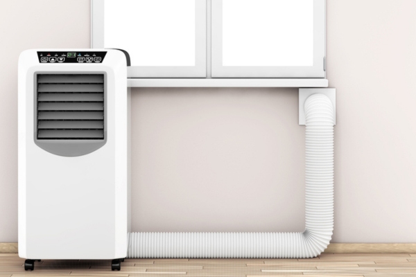 portable air conditioner against a window consuming significant floor space