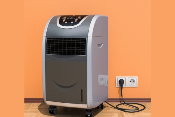 portable air conditioner plugged on the wall